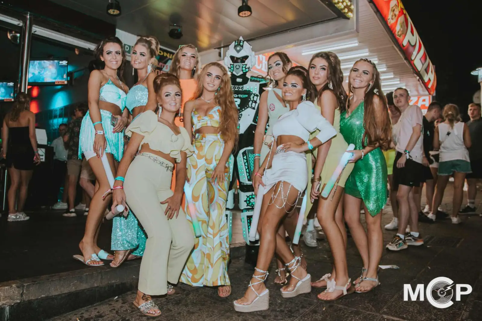 A group of friends on the Magaluf strip outside an MCP club